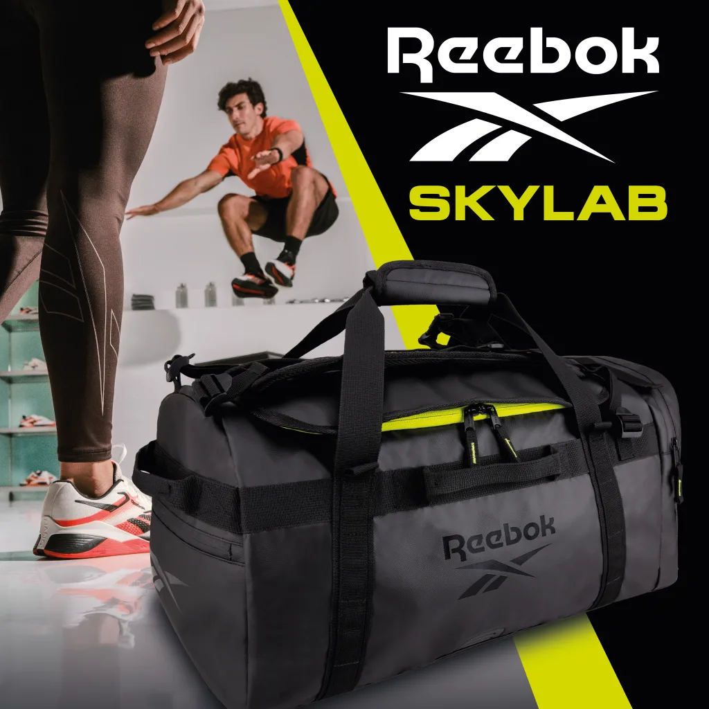 FCSI | A Reebok Skylab promotional image featuring a black duffel bag in the foreground. In the background, a person wearing athletic wear is jumping, with a focus on movement and fitness. Bold text reads "Reebok Skylab" in white and green.