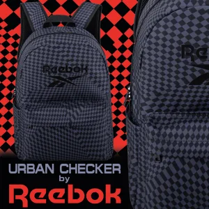 FCSI | A Reebok backpack with a black and gray checkered pattern displayed against a red and black checkered background. Text at the bottom reads "Urban Checker by Reebok.